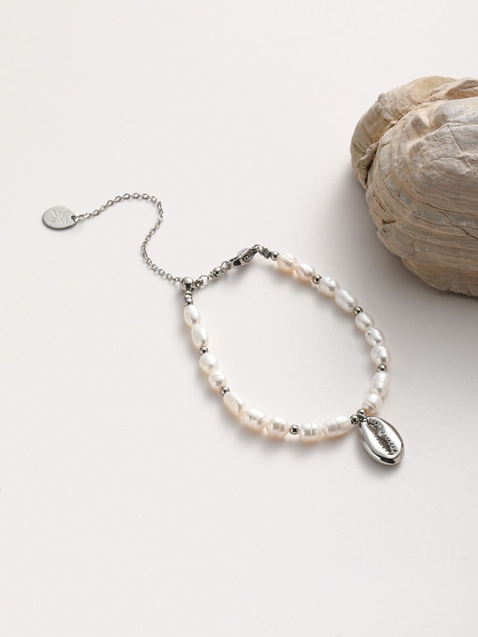 Bracciale perle fiume e conchiglia