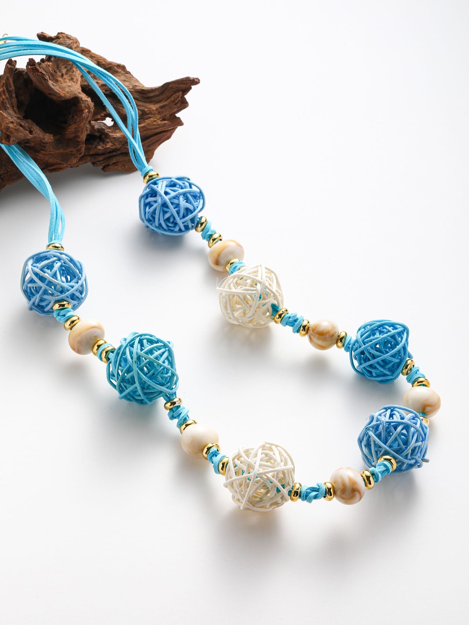 Collana con 7 parline treciati in RATTAN