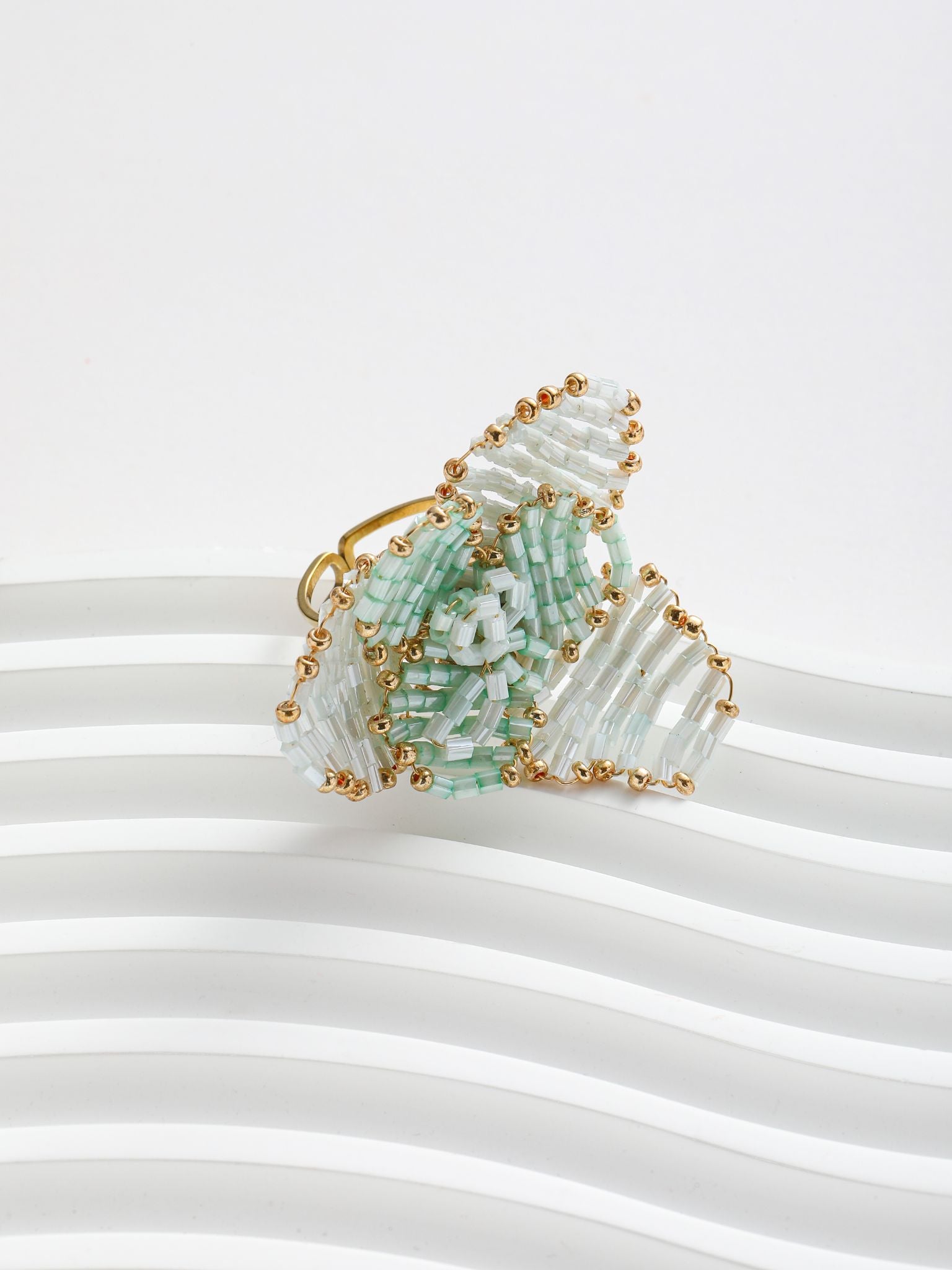 Anello intreccio di perline a fiore