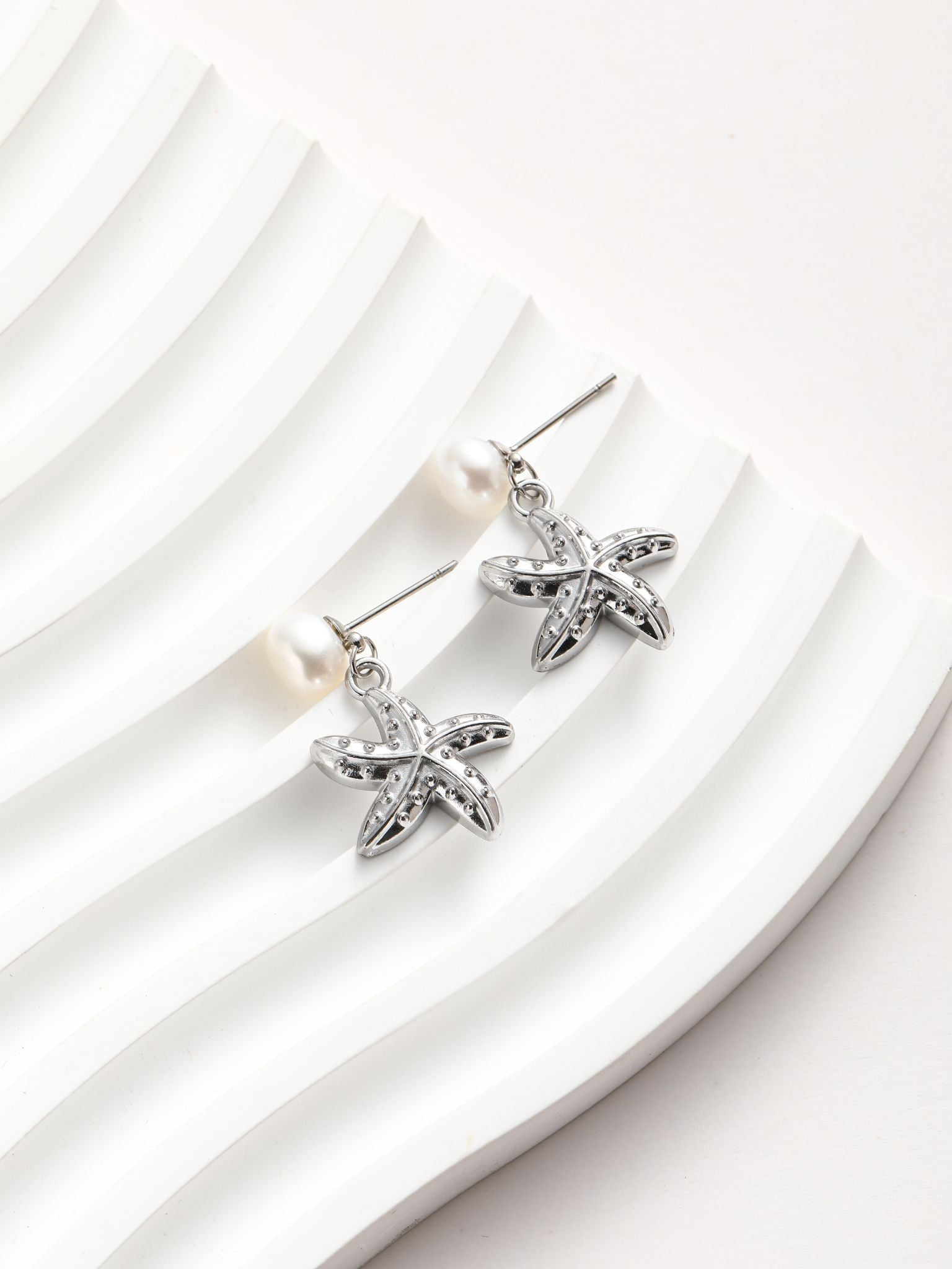 Orecchini perle fiume e stella marino