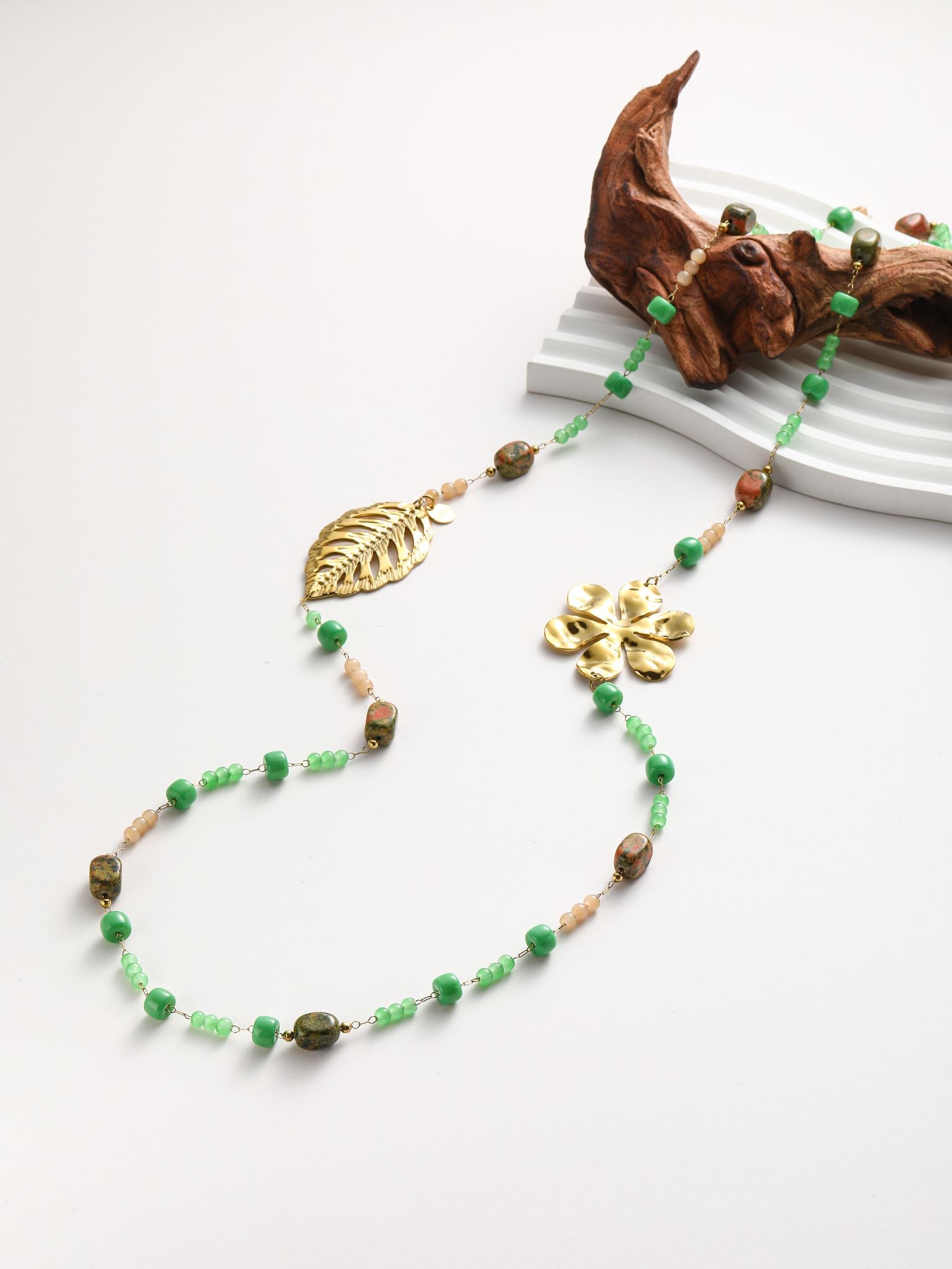 Collana Con fiore e foglia di acciaio