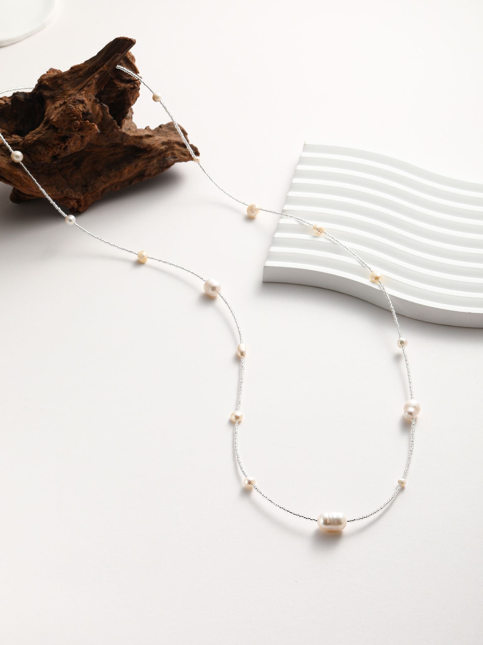 Collana in perle fiume e perline