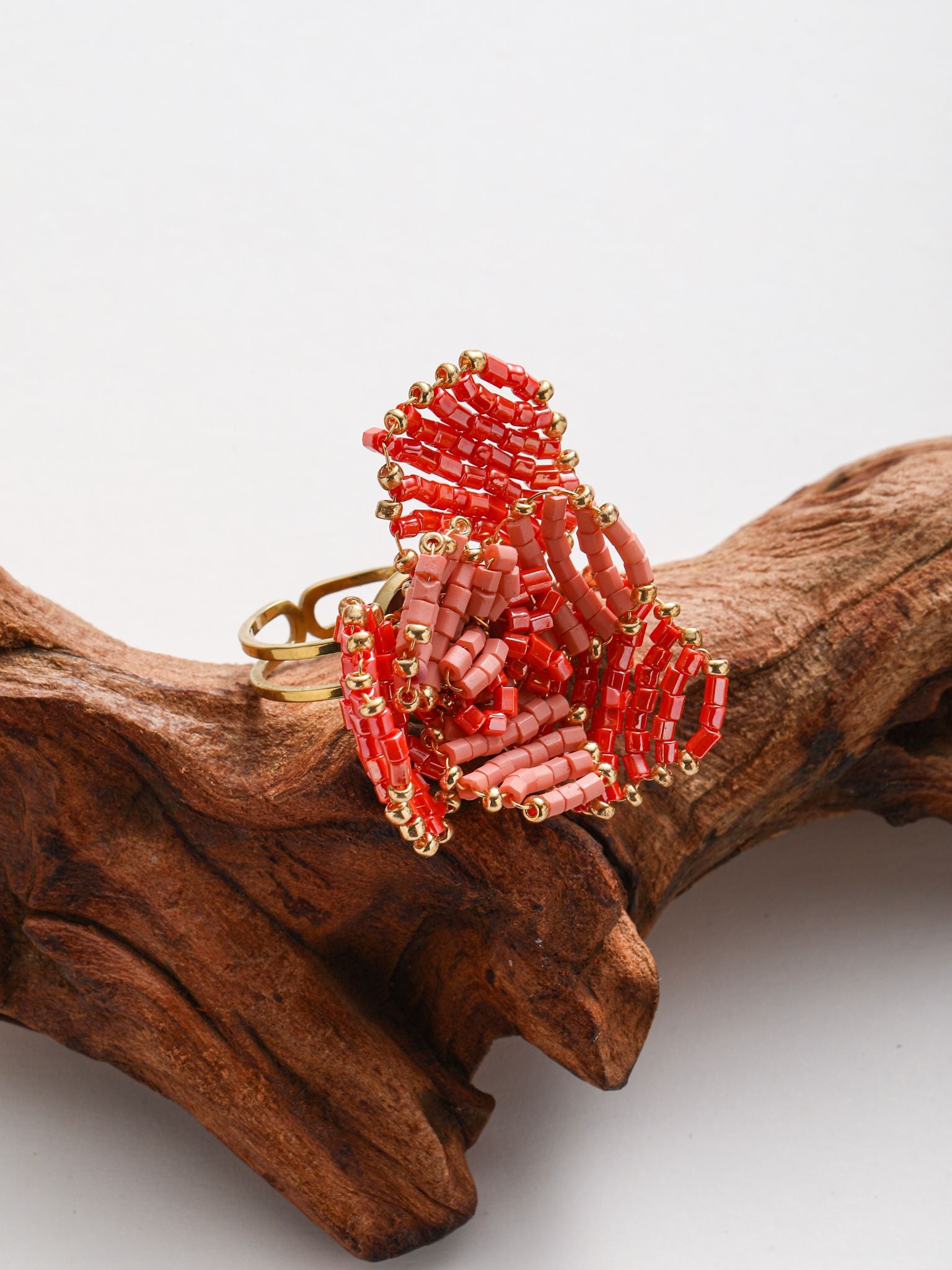 Anello intreccio di perline a fiore