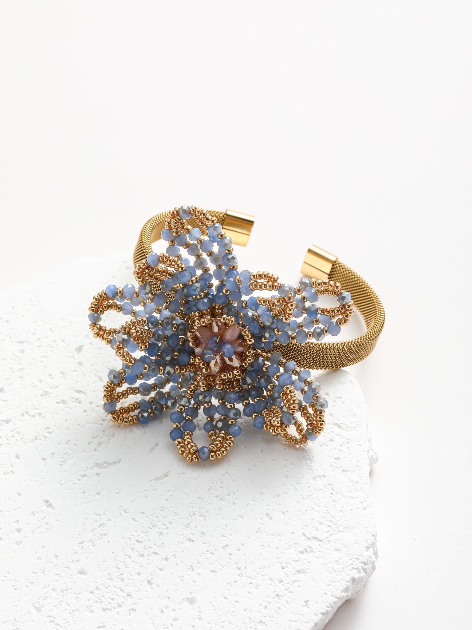 Bracciale con fiore in acciaio