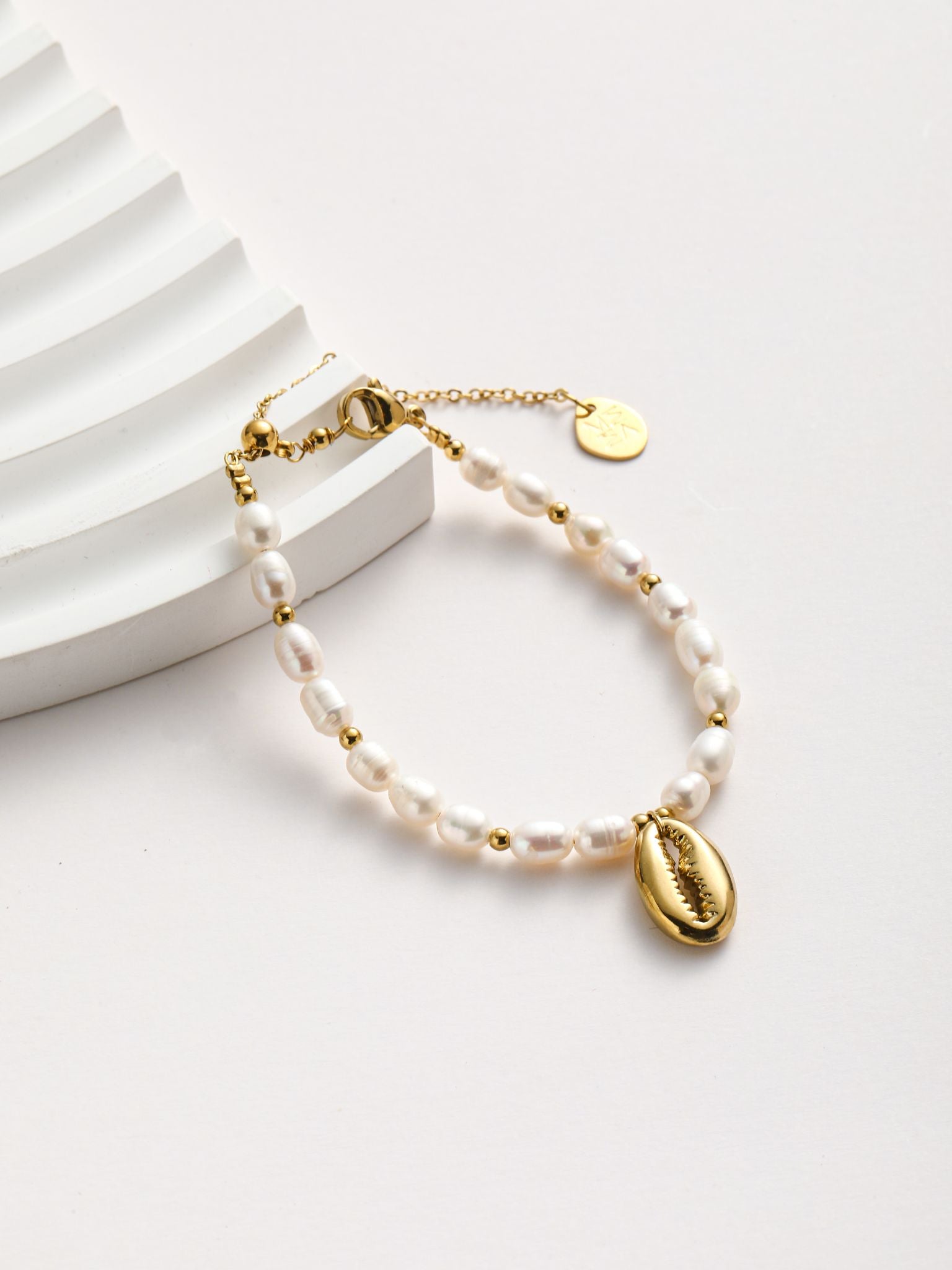 Bracciale perle fiume e conchiglia
