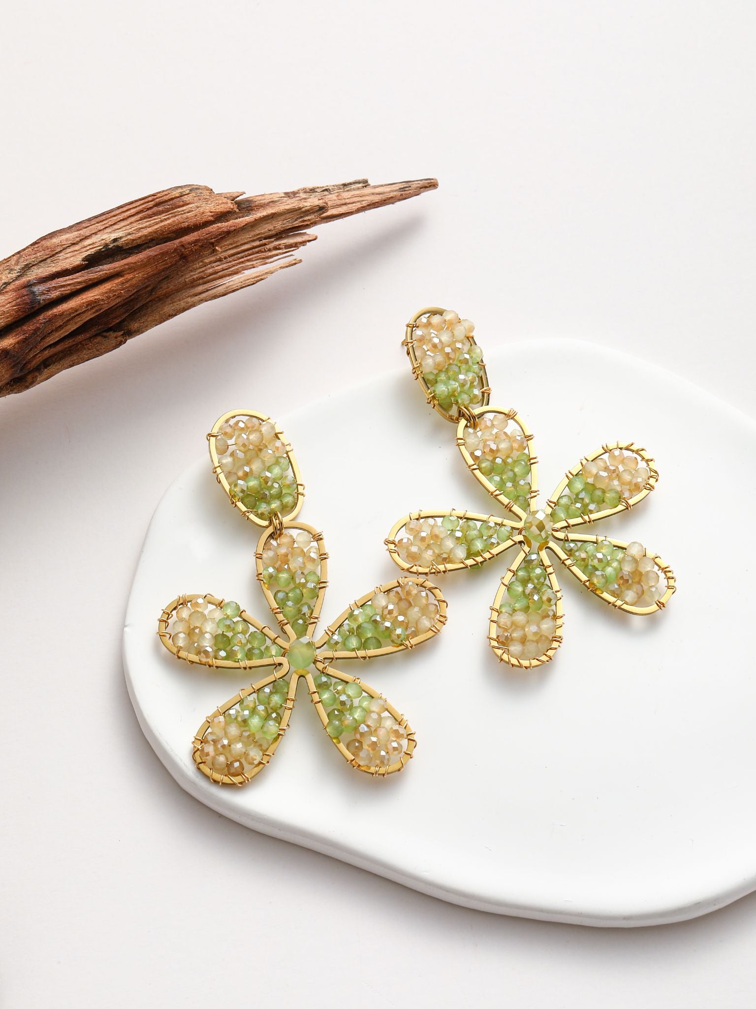 Orecchini intreccio di cristalli a forma fiore