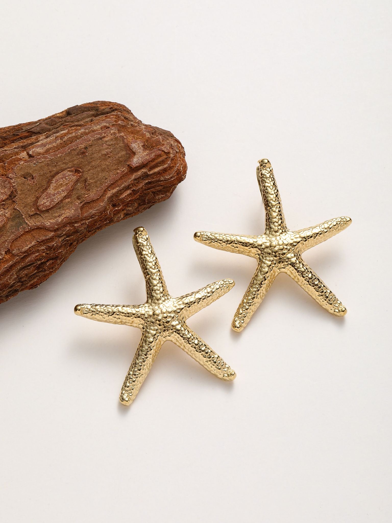 Orecchini a forma stella marina diametro 50