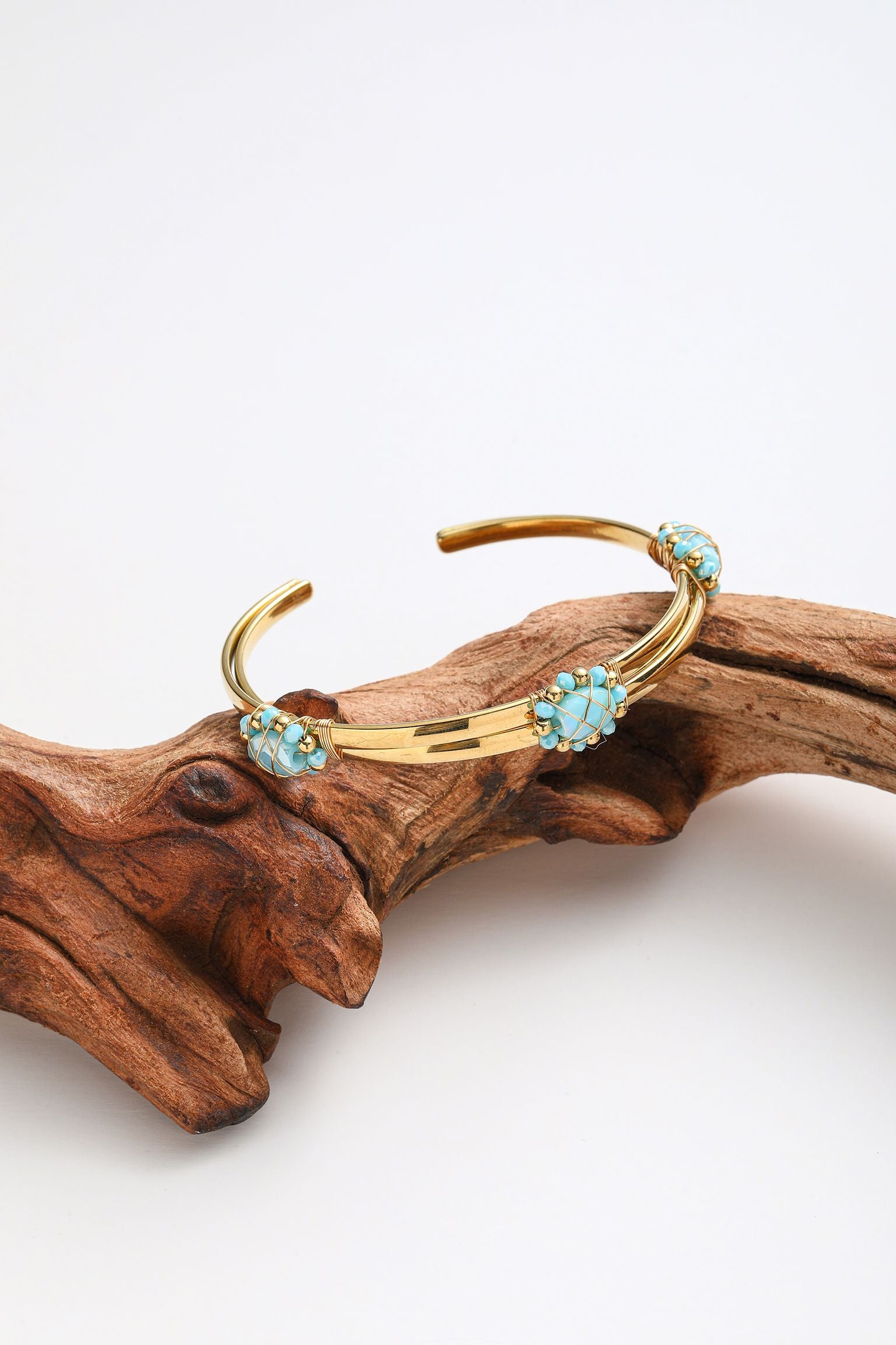 Bracciale rigido con treccio di cristalli
