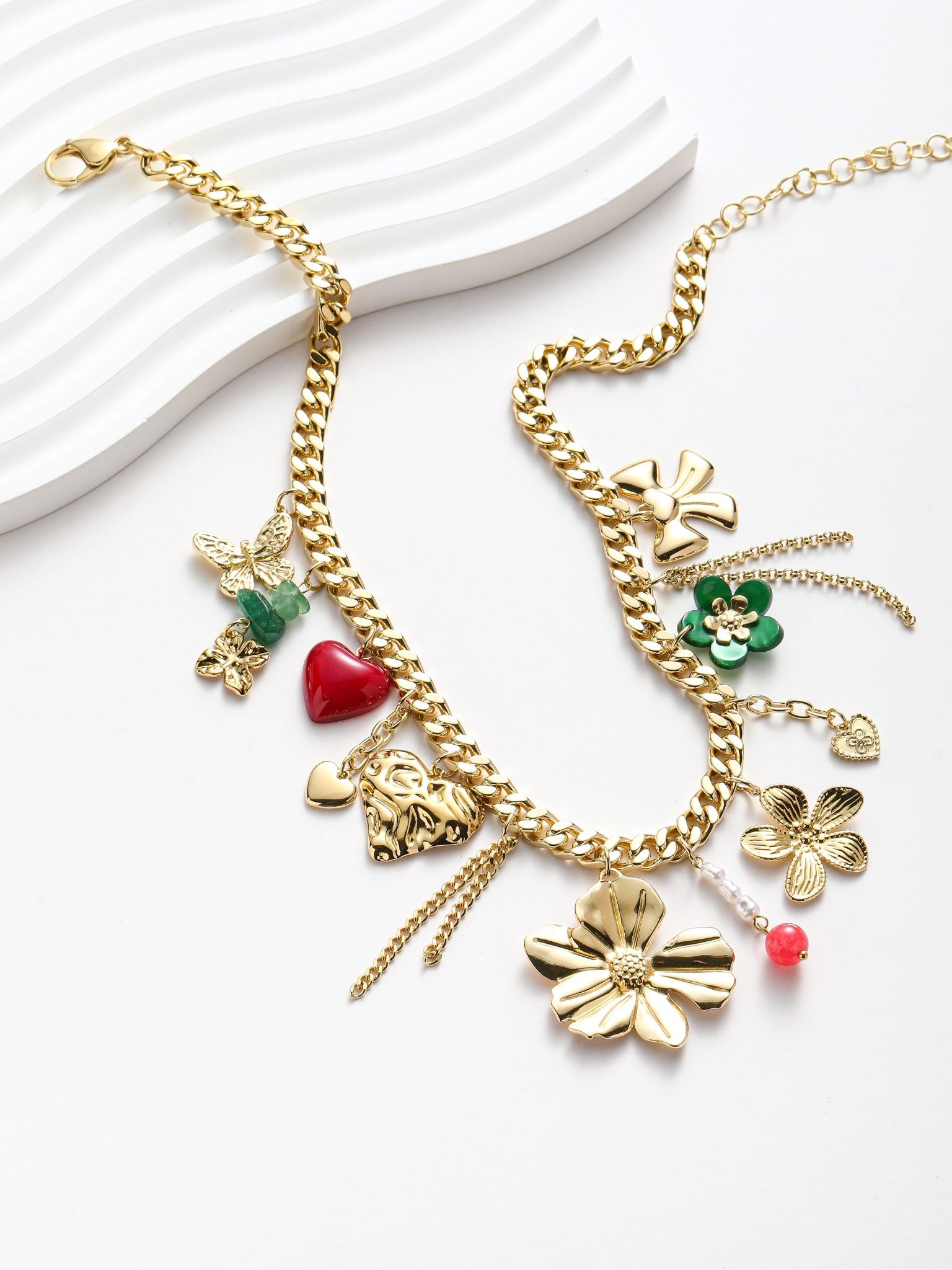 Collana con pedenti fiore cuore catene ect.